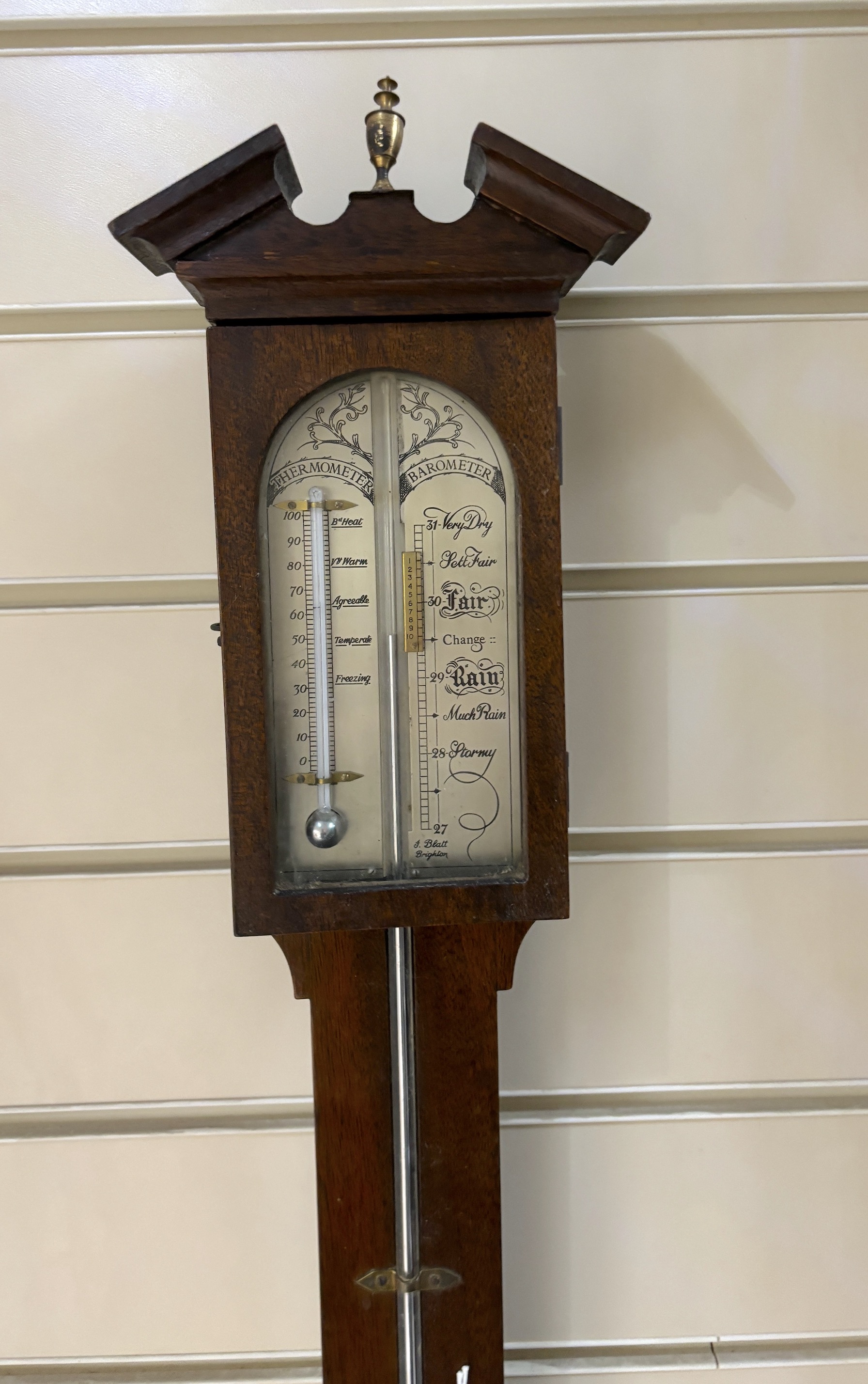 A Georgian style mahogany stick barometer, signed J. Blatt, Brighton, 97cm long